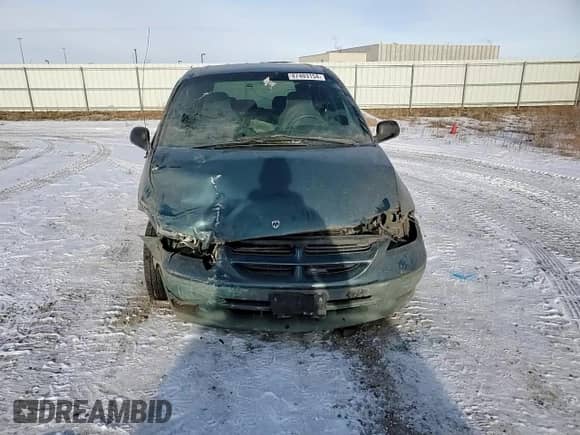 2000 Dodge Caravan SE z VIN 2B4GP45G2YR702617, wystawiony jako Copart lot #87403154 z przebiegiem Nie podano mil oraz Szkoda całkowita • Salvage title. Historia ofert i sprzedaży dostępna na DreamBid. Obrazek 12.