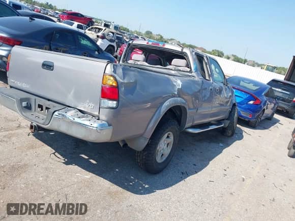 2002 Toyota Tundra Limited z VIN 5TBRT38152S228887, wystawiony jako IAAI lot #43129902 z przebiegiem Nie podano mil oraz . Historia ofert i sprzedaży dostępna na DreamBid. Obrazek 4.