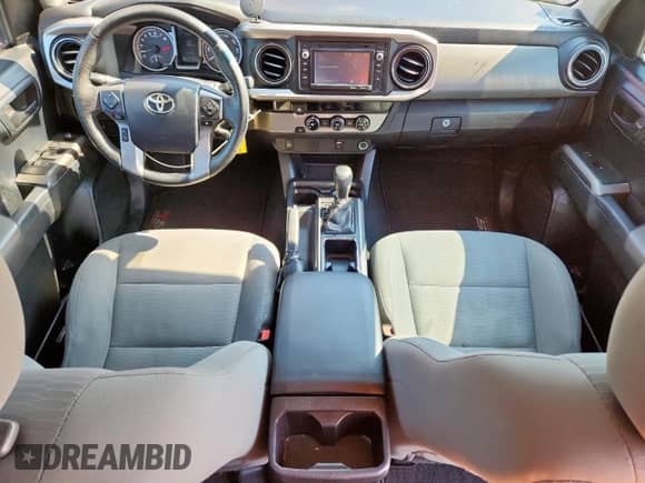 2016 Toyota Tacoma TRD Off Road с VIN 3TMAZ5CN8GM006585, выставлен на аукционе Copart как лот 70260245 с пробегом 94 079 миль миль и Списание • Salvage title. История ставок и продаж доступна на DreamBid. Изображение 8.