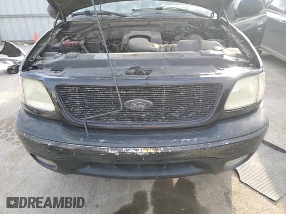 2003 Ford F-150 XLT z VIN 1FTRW08L83KC30799, wystawiony jako Copart lot #85860555 z przebiegiem Nie podano mil oraz Szkoda całkowita • Salvage title. Historia ofert i sprzedaży dostępna na DreamBid. Obrazek 11.