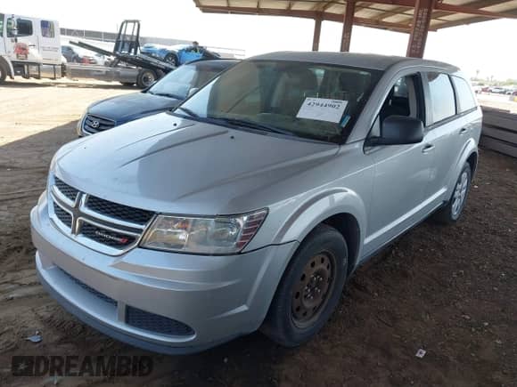 2014 Dodge Journey American Value with VIN 3C4PDCABXET285286, listed as a IAAI auction lot 42944902 with 169,650 mi miles and . Bid and sale history available at DreamBid. Image 2.