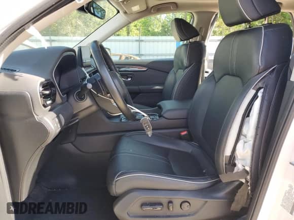 2023 Honda Pilot Elite with VIN 5FNYG1H82PB024617, listed as a Copart auction lot 55943805 with 53,461 mi miles and Salvage title. Bid and sale history available at DreamBid. Image 7.