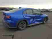 2023 Subaru WRX with VIN JF1VBAA64P9820666, listed as a Copart auction lot 52422165 with 10,726 mi miles and Salvage title. Bid and sale history available at DreamBid. Image 3.