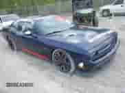 2013 Dodge Challenger SRT-8 with VIN 2C3CDYCJ2DH680509, listed as a IAAI auction lot 41922696 with 183,100 mi miles and . Bid and sale history available at DreamBid. Image 1.