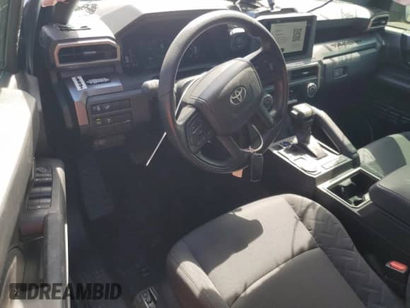 2025 Toyota Tacoma SR5 with VIN 3TYKB5FN9ST019699, listed as a Copart auction lot 80286985 with 1,276 mi miles and Non repairable. Bid and sale history available at DreamBid. Image 8.