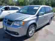 2018 Dodge Grand Caravan SXT with VIN 2C4RDGCG5JR207861, listed as a IAAI auction lot 42955827 with 125,357 mi miles and . Bid and sale history available at DreamBid. Image 17.