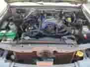 2004 Nissan Frontier XE z VIN 1N6ED29X64C430767, wystawiony jako Copart lot #62191075 z przebiegiem 110 110 mil mil oraz Szkoda całkowita • Salvage title. Historia ofert i sprzedaży dostępna na DreamBid. Obrazek 11.