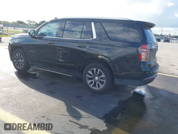 2021 Chevrolet Tahoe LT z VIN 1GNSCNKD2MR443255, wystawiony jako IAAI lot #43364345 z przebiegiem 133 418 mil mil oraz . Historia ofert i sprzedaży dostępna na DreamBid. Obrazek 3.