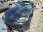 2006 Hyundai Tiburon GT с VIN KMHHN65FX6U191069, выставлен на аукционе Copart как лот 68652734 с пробегом Не указан миль и Чистый • Clean title. История ставок и продаж доступна на DreamBid. Изображение 5.