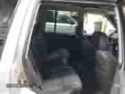 1996 Jeep Grand Cherokee Laredo z VIN 1J4GZ58S5TC293897, wystawiony jako IAAI lot #42435233 z przebiegiem 167 432 mil mil oraz . Historia ofert i sprzedaży dostępna na DreamBid. Obrazek 8.