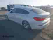 2015 BMW 5 Series 535i Gran Turismo z VIN WBA5M2C51FD872215, wystawiony jako IAAI lot #41787558 z przebiegiem 96 768 mil mil oraz . Historia ofert i sprzedaży dostępna na DreamBid. Obrazek 3.