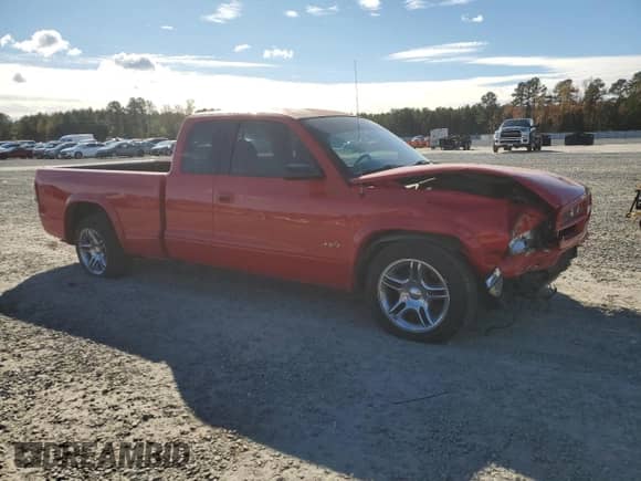2000 Dodge Dakota Sport with VIN 1B7GL22Z1YS589119, listed as a Copart auction lot 81939944 with 144,952 mi miles and Salvage title. Bid and sale history available at DreamBid. Image 4.
