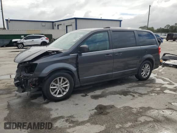 2018 Dodge Grand Caravan SXT with VIN 2C4RDGCG0JR226138, listed as a Copart auction lot 85570965 with 125,805 mi miles and Salvage title. Bid and sale history available at DreamBid. Image 1.