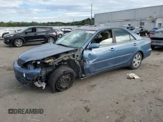2003 Toyota Camry XLE с VIN 4T1BE30K23U692025, выставлен на аукционе Copart как лот 84215745 с пробегом 149 774 миль миль и Списание • Salvage title. История ставок и продаж доступна на DreamBid. Изображение 1.