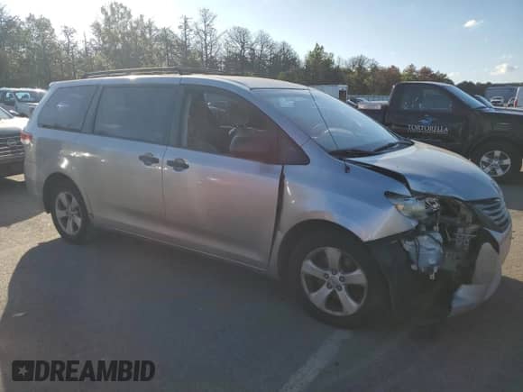 2012 Toyota Sienna with VIN 5TDZK3DC3CS210035, listed as a Copart auction lot 83798255 with 319,065 mi miles and Salvage title. Bid and sale history available at DreamBid. Image 4.