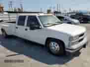 1999 Chevrolet Silverado 3500 with VIN 1GCHC33J7XF024092, listed as a Copart auction lot 64849475 with 188,547 mi miles and Non repairable. Bid and sale history available at DreamBid. Image 4.