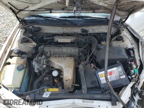 1993 Toyota Camry LE z VIN JT2SK12E6P0100267, wystawiony jako Copart lot #64142305 z przebiegiem 292 298 mil mil oraz Szkoda całkowita • Salvage title. Historia ofert i sprzedaży dostępna na DreamBid. Obrazek 11.