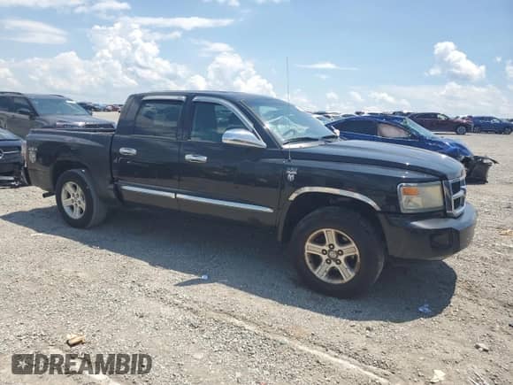 2010 Dodge Dakota Bighorn/Lonestar with VIN 1D7CW3GP3AS108270, listed as a Copart auction lot 63623405 with 216,348 mi miles and Non repairable. Bid and sale history available at DreamBid. Image 4.