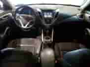 2014 Hyundai Veloster z VIN KMHTC6AD4EU212324, wystawiony jako Copart lot #71514455 z przebiegiem 120 419 mil mil oraz Czysty tytuł • Clean title. Historia ofert i sprzedaży dostępna na DreamBid. Obrazek 8.