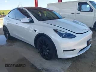 2022 Tesla Model Y Performance with VIN 7SAYGDEF2NF336635, listed as a IAAI auction lot 43255322 with 49,565 mi miles and . Bid and sale history available at DreamBid. Image 1.