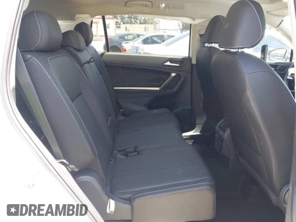 2024 Volkswagen Tiguan SE with VIN 3VVNB7AX4RM198923, listed as a IAAI auction lot 42312597 with 6,827 mi miles and . Bid and sale history available at DreamBid. Image 8.