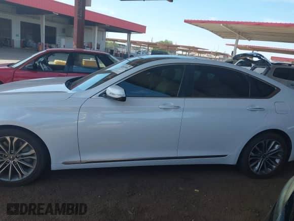 2015 Hyundai Genesis 3.8L with VIN KMHGN4JE3FU015302, listed as a IAAI auction lot 42923519 with 123,570 mi miles and . Bid and sale history available at DreamBid. Image 14.