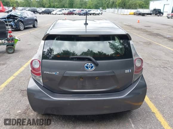2014 Toyota Prius One with VIN JTDKDTB38E1562235, listed as a IAAI auction lot 43048418 with 164,639 mi miles and . Bid and sale history available at DreamBid. Image 16.