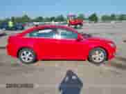 2014 Chevrolet Cruze 1LT z VIN 1G1PC5SB5E7472073, wystawiony jako IAAI lot #42938314 z przebiegiem 57 585 mil mil oraz . Historia ofert i sprzedaży dostępna na DreamBid. Obrazek 13.