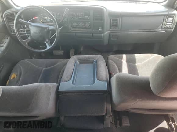 2001 GMC Sierra 1500 SLE with VIN 1GTEC19TX1Z184960, listed as a Copart auction lot 57400115 with 167,974 mi miles and Salvage title. Bid and sale history available at DreamBid. Image 8.