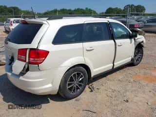 2018 Dodge Journey SE with VIN 3C4PDCABXJT448934, listed as a IAAI auction lot 42614601 with Not provided miles and . Bid and sale history available at DreamBid. Image 4.
