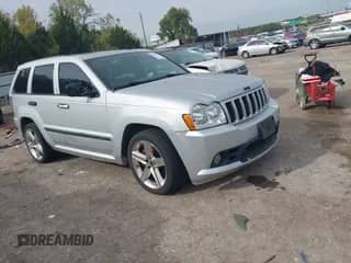 2006 Jeep Grand Cherokee SRT-8 with VIN 1J8HR78316C341911, listed as a IAAI auction lot 43580619 with 146,360 mi miles and . Bid and sale history available at DreamBid. Image 1.