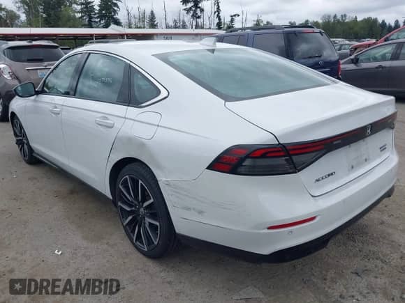 2023 Honda Accord Touring with VIN 1HGCY2F81PA037420, listed as a IAAI auction lot 42697458 with 42,731 mi miles and . Bid and sale history available at DreamBid. Image 3.