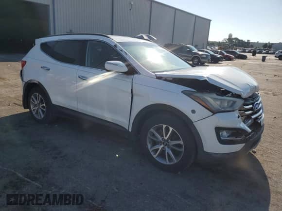 2014 Hyundai Santa Fe с VIN 5XYZU3LAXEG127728, выставлен на аукционе Copart как лот 69298855 с пробегом 98 371 миль миль и Списание • Salvage title. История ставок и продаж доступна на DreamBid. Изображение 4.