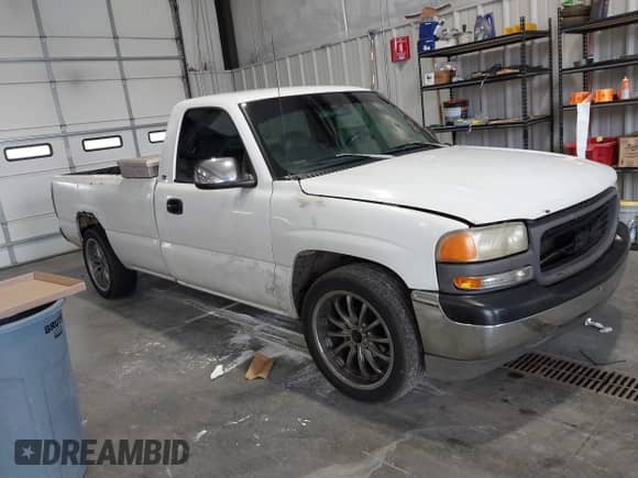 1999 GMC Sierra 1500 SL z VIN 1GTEC14V7XE850553, wystawiony jako IAAI lot #42751151 z przebiegiem 308 861 mil mil oraz . Historia ofert i sprzedaży dostępna na DreamBid. Obrazek 1.