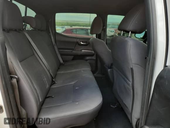 2018 Toyota Tacoma SR z VIN 3TMCZ5AN3JM164612, wystawiony jako Copart lot #70181335 z przebiegiem 134 510 mil mil oraz Szkoda całkowita • Salvage title. Historia ofert i sprzedaży dostępna na DreamBid. Obrazek 10.