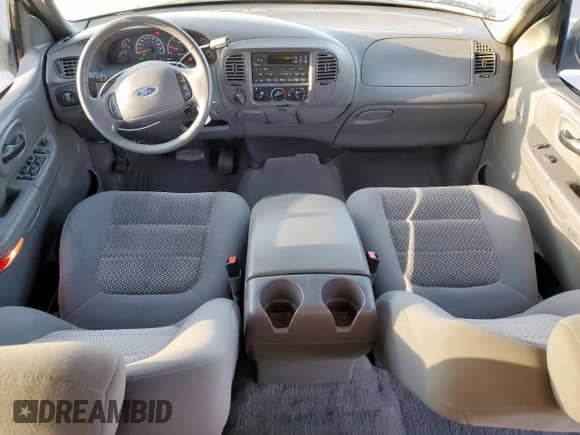 2002 Ford F-150 XLT с VIN 1FTRW08692KD89789, выставлен на аукционе Copart как лот 52621555 с пробегом 150 012 миль миль и Списание • Salvage title. История ставок и продаж доступна на DreamBid. Изображение 8.