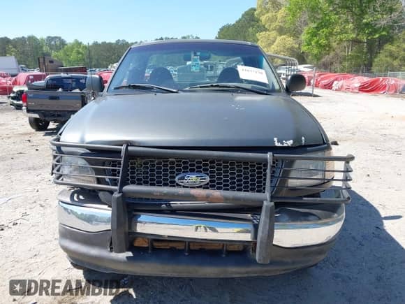 2003 Ford F-150 XL z VIN 1FTRF18243NB29920, wystawiony jako IAAI lot #42037138 z przebiegiem 230 215 mil mil oraz . Historia ofert i sprzedaży dostępna na DreamBid. Obrazek 12.