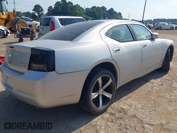 2010 Dodge Charger SXT with VIN 2B3CA3CV7AH126938, listed as a IAAI auction lot 42838919 with 188,868 mi miles and . Bid and sale history available at DreamBid. Image 4.