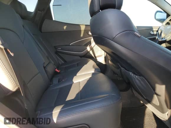 2015 Hyundai Santa Fe с VIN 5XYZWDLA2FG293470, выставлен на аукционе Copart как лот 87119555 с пробегом 168 704 миль миль и Списание • Salvage title. История ставок и продаж доступна на DreamBid. Изображение 11.