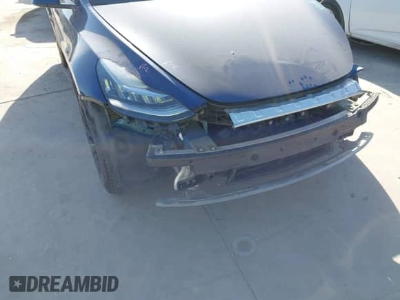 2022 Tesla Model Y Long Range z VIN 7SAYGDEE9NF443673, wystawiony jako IAAI lot #42878246 z przebiegiem 65 689 mil mil oraz . Historia ofert i sprzedaży dostępna na DreamBid. Obrazek 6.