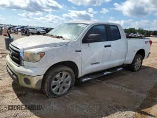2010 Toyota Tundra z VIN 5TFRY5F17AX077101, wystawiony jako Copart lot #90313495 z przebiegiem 174 794 mil mil oraz Czysty tytuł • Clean title. Historia ofert i sprzedaży dostępna na DreamBid. Obrazek 1.