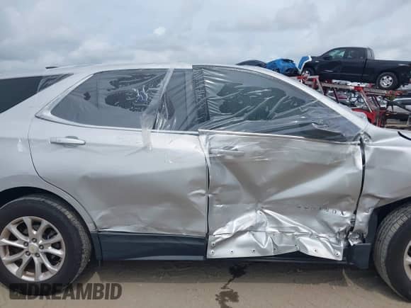 2018 Chevrolet Equinox LT with VIN 2GNAXJEV1J6211511, listed as a IAAI auction lot 43246513 with 98,802 mi miles and . Bid and sale history available at DreamBid. Image 6.