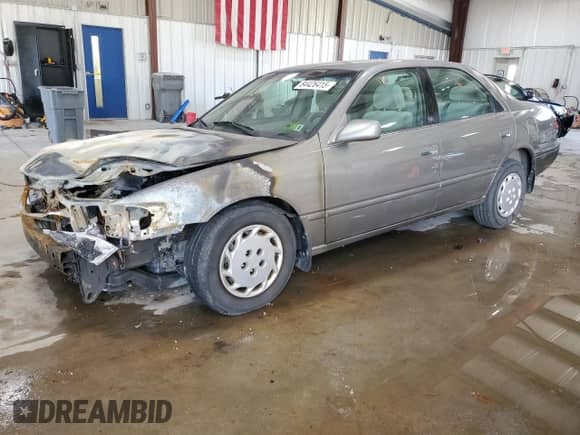 1997 Toyota Camry LE с VIN 4T1BG22K9VU116419, выставлен на аукционе Copart как лот 84426415 с пробегом Не указан миль и Списание • Salvage title. История ставок и продаж доступна на DreamBid. Изображение 1.