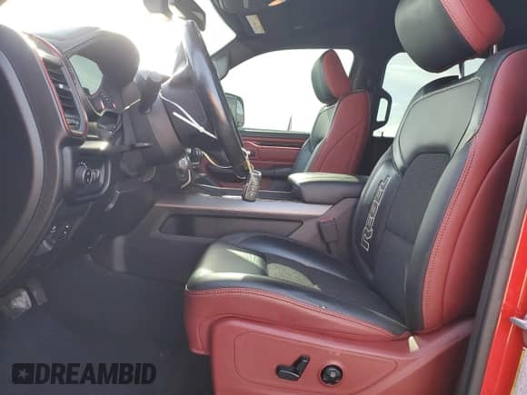 2019 Ram 1500 Rebel z VIN 1C6RRELT0KN614821, wystawiony jako Copart lot #64195475 z przebiegiem 97 406 mil mil oraz Nie do naprawy • Non repairable. Historia ofert i sprzedaży dostępna na DreamBid. Obrazek 7.