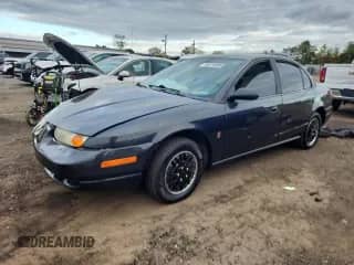 2000 Saturn SL with VIN 1G8ZG5288YZ249330, listed as a Copart auction lot 86113035 with Not provided miles and Salvage title. Bid and sale history available at DreamBid. Image 1.