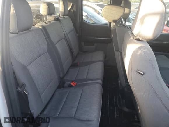 2022 Ford F-150 XL z VIN 1FTFX1C84NKE67799, wystawiony jako Copart lot #79123654 z przebiegiem Nie podano mil oraz Nie do naprawy • Non repairable. Historia ofert i sprzedaży dostępna na DreamBid. Obrazek 11.