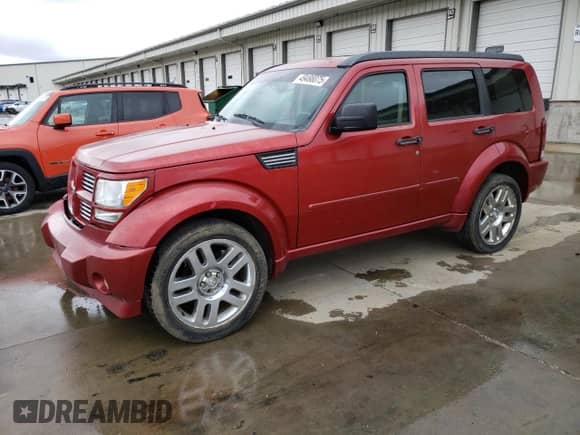 2007 Dodge Nitro R/T with VIN 1D8GT58697W704119, listed as a Copart auction lot 49498075 with 258,399 mi miles and Salvage title. Bid and sale history available at DreamBid. Image 1.