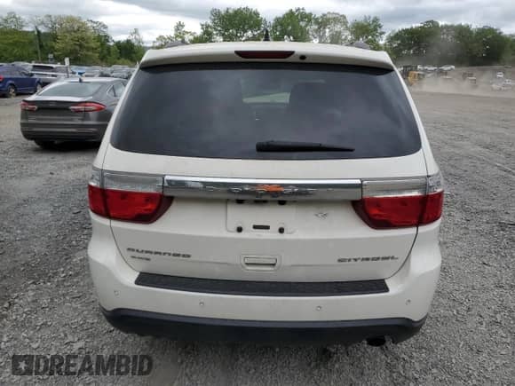 2012 Dodge Durango Citadel z VIN 1C4RDJEG9CC330746, wystawiony jako Copart lot #57567385 z przebiegiem 146 921 mil mil oraz Szkoda całkowita • Salvage title. Historia ofert i sprzedaży dostępna na DreamBid. Obrazek 6.