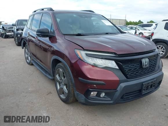 2019 Honda Passport Touring with VIN 5FNYF7H95KB004417, listed as a IAAI auction lot 42551496 with 62,948 mi miles and . Bid and sale history available at DreamBid. Image 1.