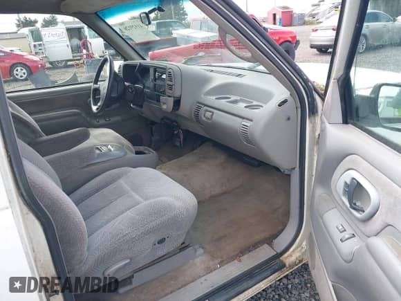1995 GMC Sierra 1500 z VIN 2GTEC19K7S1593550, wystawiony jako IAAI lot #41929126 z przebiegiem 255 453 mil mil oraz . Historia ofert i sprzedaży dostępna na DreamBid. Obrazek 5.